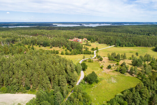 Aerial of old highway in the Kalmar in summer with Achipelago