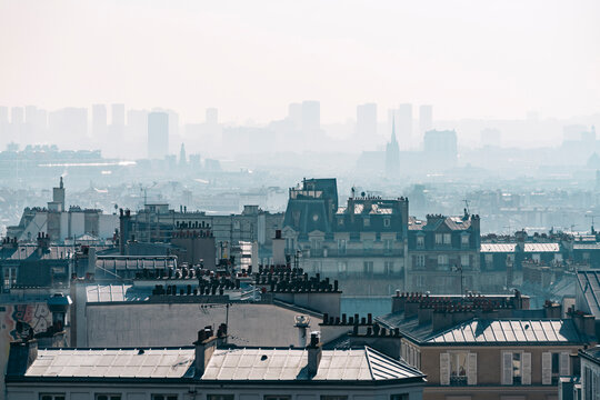 Residential buildings in city during foggy weather