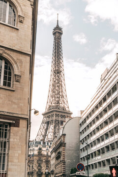Low angle view of buildings against Eiffel tower