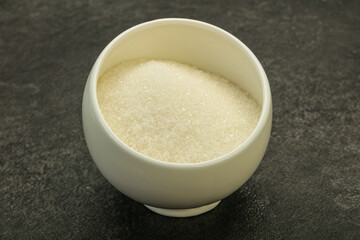 White sugar in the bowl