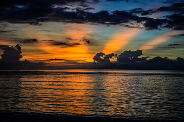 Fototapeta premium The view of the sunset over the Gili Trawangan island in Indonesia