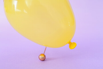 Office pin and air balloon on color background