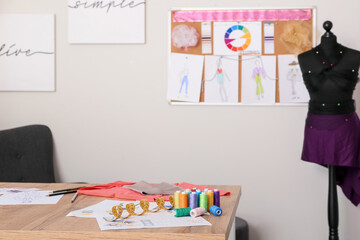 Interior of modern fashion designer workplace