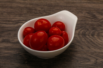 Pickled cherry tomatoes in the bowl