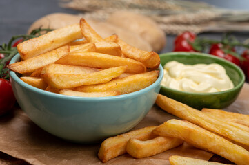 Bown with fresh cooked french fries potato chips with belgian mayonnaise sauce