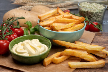 Bown with fresh cooked french fries potato chips with belgian mayonnaise sauce