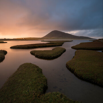Bust of light over Ceapabhal and coastal marsh, Northton - An Taobh Tuath, Isle of Harris, Scotland