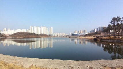 reflection of the city in the lake