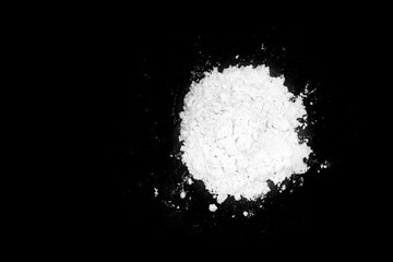 Obraz na płótnie Canvas White powder isolated on black background