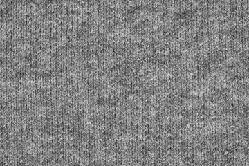 Gray natural texture of knitted wool textile material background. grey crochet cotton fabric woven canvas texture. close up