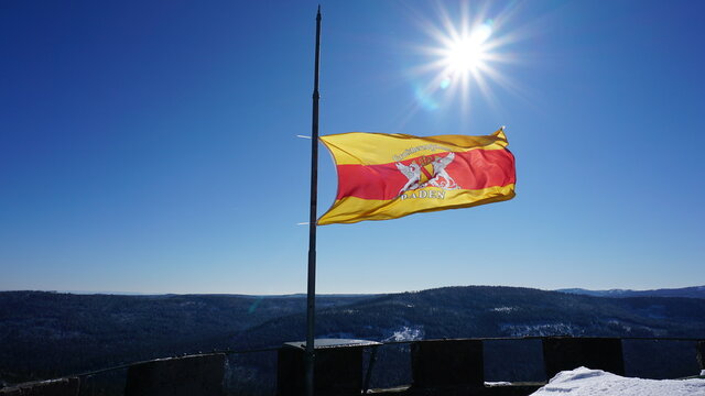 a flag on the top of the Friedrichsturm on the Badener Hoehe in the Nordschwarzwald (Northern Black Forest) in the region Baden-Wuerttemberg, Germany (translation: Grand Duchy Baden), in February