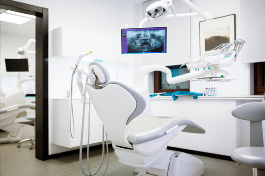 Dentist's chair and dental equipment in clinic