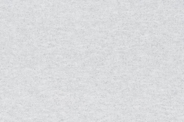 White natural texture of knitted wool textile material background. White crochet cotton fabric woven canvas texture. close up