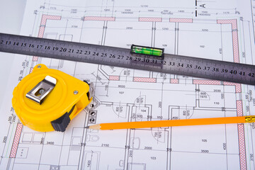 House project with tape meter and pencil