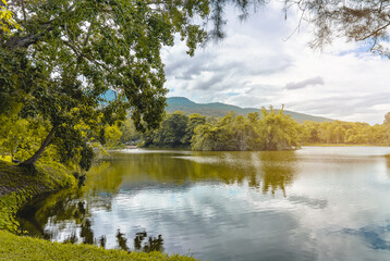 Small mountain lake with reflect water