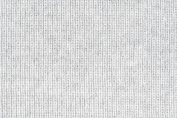 White natural texture of knitted wool textile material background. White crochet cotton fabric...