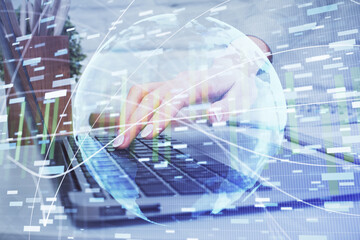 Double exposure of woman hands typing on computer and business theme hologram drawing. Success...