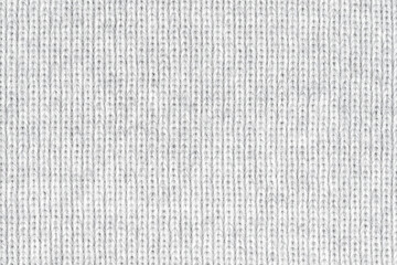 White natural texture of knitted wool textile material background. White crochet cotton fabric woven canvas texture. close up