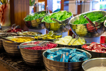 Vegetables on the open buffet.Salad bar.