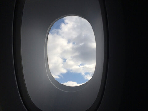 Clouds seen through airplane window