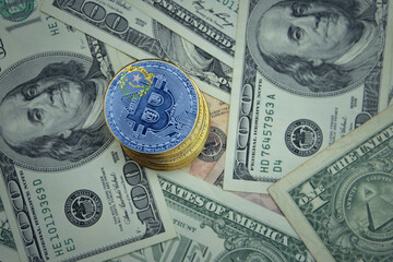 golden shining bitcoins with flag of nevada state on a dollar money background.