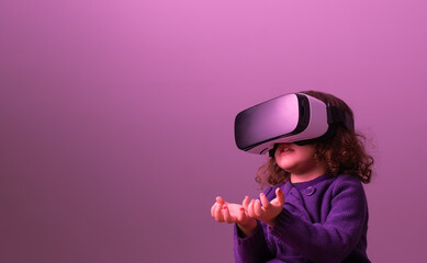 little girl with virtual reality glasses