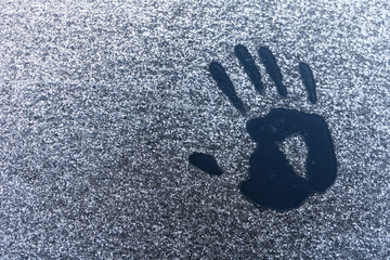 hand print on the background with snowflakes