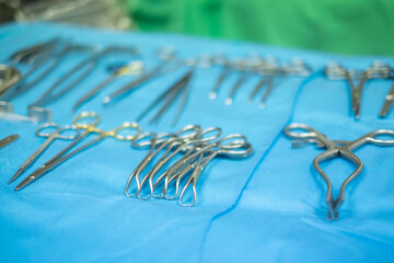 Surgical equipment and medical devices in operating room. Sterile scissors and other medical...