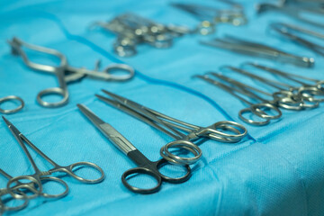 Surgical equipment and medical devices in operating room. Sterile scissors and other medical instruments