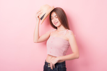 Portrait of beautiful asia young woman on Pink color background with copy space. Human face...