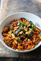 Bulgur wheat tagine with aubergine and cashew nuts