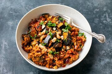 Bulgur wheat tagine with aubergine and cashew nuts