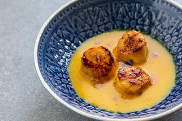 Scallops in spicy gulai sauce, Indonesian curry