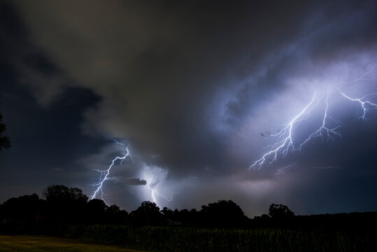 Low angle view of thunderstorm and lightning at Badlands National Park