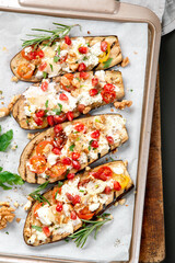 Fresh baked eggplants with walnuts and pomegranate. Delicious summer snack