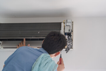 Air conditioning repair service by technician