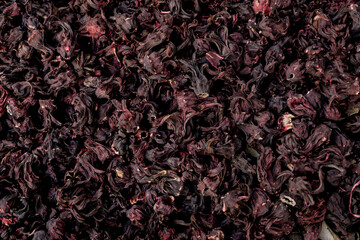 Macro texture of natural dry hibiscus herbal tea