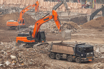 Excavators are working at the construction site.