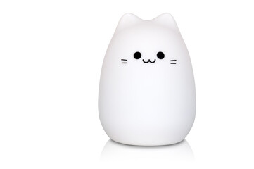 white cat shaped night lamp isolated on white