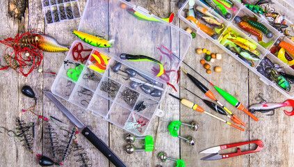 accessories for fishing on a wooden background. selective focus.