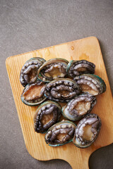 Fresh raw abalone on marble 