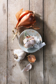 Garlic Onions Still Life on Wood Table