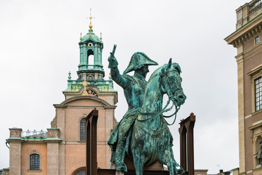 Karl XIV Johans statue near the royal palace in gamla stan in summer