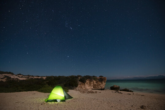 A tent at night in a beach at Del Carmen Island in Loreto