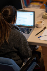 Girl working from home with a laptop