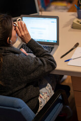 Girl working from home with a laptop