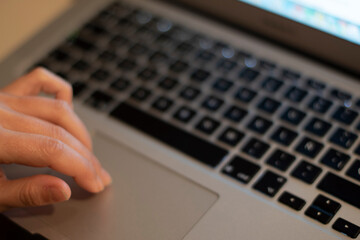 Girl working from home with a laptop