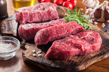 Raw beef steak on a cutting board