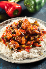 Sweet and sour chicken with colorful bell pepper with rice