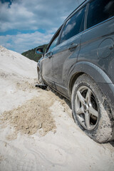 Fototapeta na wymiar suv car stuck in sand